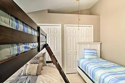 a small room with a bunk bed and a ladder at 4 Bed Villa in Kissimmee, Orlando in Kissimmee