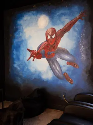 a painting of a spider man on a wall at Casa c/ Piscina, Sala de Jogos e 6 Suítes in Orlando