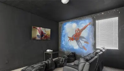 a living room with a couch and a painting on the wall at Casa c/ Piscina, Sala de Jogos e 6 Suítes in Orlando