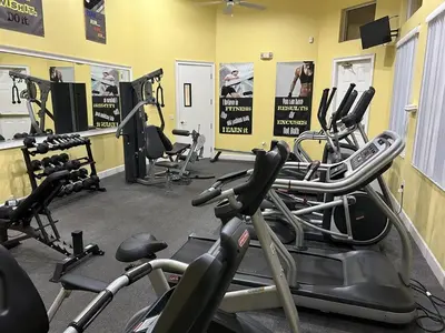a gym with several exercise bikes in a room at Ideal 3 BR Resort Villa with Laundry in Kissimmee