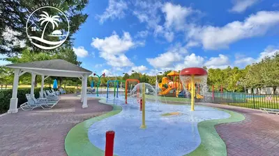 a playground with a water park with a water slide at Deluxe Villas Resort at Seven Dwrafs - Close to Disney in Kissimmee