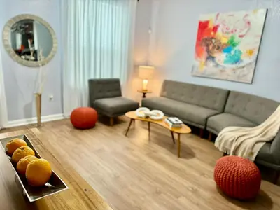 a living room with a couch and a table at P42 New Townhouse at Vista Cay Walking distance to CCCO in Orlando
