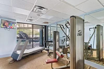 a gym with treadmills and elliptical machines at 6165 Carrier Drive 1001 in Orlando