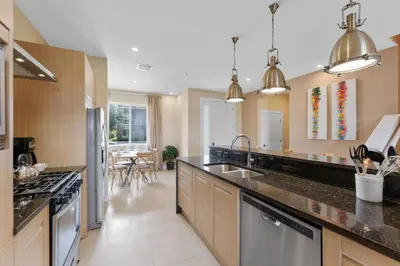 a kitchen with a sink and a counter top at Luxury 4BR Townhouse Next to Disney Orlando 3201 in Orlando