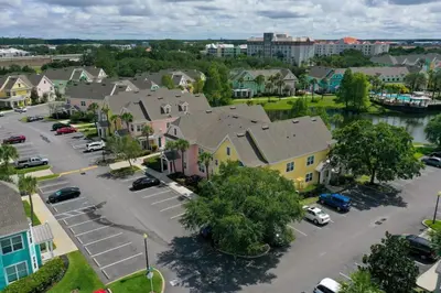an aerial view of a town with a parking lot at Runaway Beach Club Resort Condo Apt Disney 6102 in Kissimmee