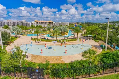 an aerial view of a water park at a resort at Modern Storey Lake Resort Disney Orlando 3191-103 in Kissimmee