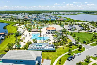 an aerial view of a resort with a pool at Modern Storey Lake Resort Disney Orlando 3141-105 in Kissimmee