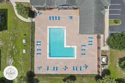 an aerial view of a house with a swimming pool at Secret Lake Resort 2BR Condo Apt Disney 3176-301 in Kissimmee