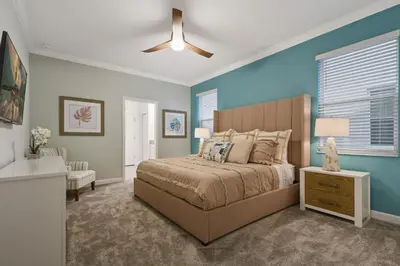 a bedroom with a bed and a ceiling fan at Welcome to the Ultimate Vacation Wonderland in Kissimmee