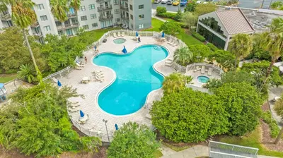 an overhead view of a swimming pool at a resort at 12 - Universal Studios, International Dr in Orlando