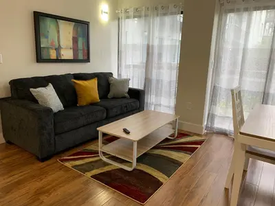 a living room with a couch and a coffee table at 12 - Universal Studios, International Dr in Orlando