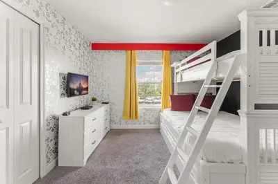 a white bedroom with a bunk bed and a ladder at 5BR 10 minutes from Disney Springs SL4800 in Kissimmee