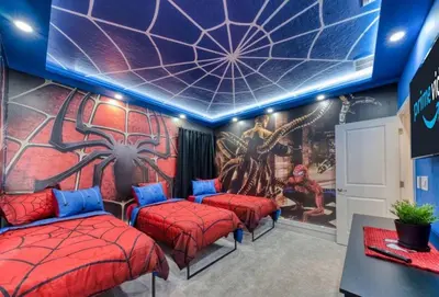 a room with four beds and a spiderweb mural at Experience Luxury in Your 11 En-Suites Mansion in Orlando