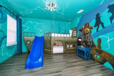 a childs room with a blue ceiling with a pirate theme at Glorious Home Near Disney With Game Room, Themed Rooms, Waterpark & Resort Access At Encore Resorts Reunion - 7643Wi in Kissimmee