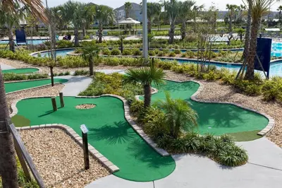 an image of a golf course at a resort at Luxuosa Casa 4Q/3B Storey Lake in Kissimmee