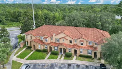 an aerial view of a house with a roof at Family Friendly Townhome Near Attractions in Orlando