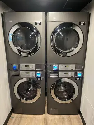 two washing machines are sitting next to each other at 15 - Amazing Vulcano Bay - Universal View in Orlando