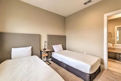 a hotel room with two beds and a bathroom at Luxury Magic Village 2mi to Disney TH7501 in Orlando