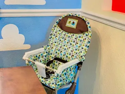 a high chair in a classroom with a table at C2821-403-Windsor Hills Resort-Free Water Park-2 Miles to Disney in Orlando
