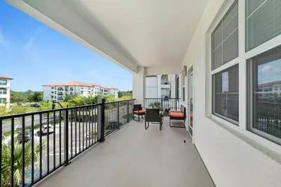 a balcony with a view of a street at Vista Cay by CY -Harry Potter 3BR in Orlando