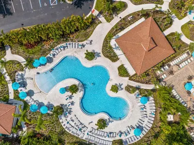 an overhead view of a swimming pool at a resort at Vista Cay by CY -Harry Potter 3BR in Orlando