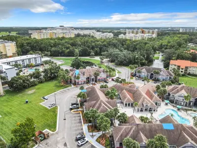 an aerial view of a residential neighborhood with houses at Be Our Guest! 1 Bedroom Condo Near Disney Parks! in Orlando