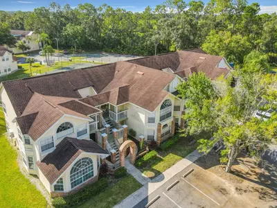 an overhead view of a house with a roof at La Casa Mediterranean! 3 Bedroom Condo Near Disney! in Kissimmee