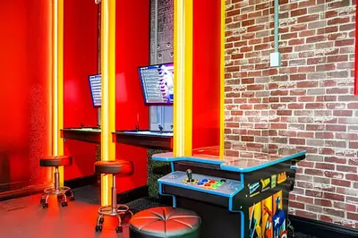 a game room with a table and a mirror at 6BD/4BA Windsor Hills | Sala de Jogos & Piscina in Orlando