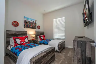 a bedroom with two twin beds and a window at RCT Dreamstay in Orlando