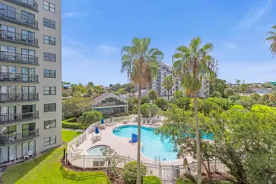 an aerial view of a swimming pool in a apartment building at 22 -The heart of International Dr - Universal in Orlando