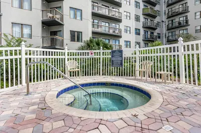 a hot tub in a patio in front of a building at 29-Universal, International Dr,Convention Center in Orlando