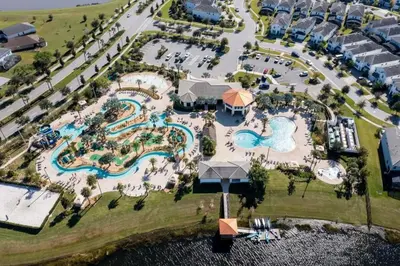an aerial view of a pool at a resort at Villa 5 Quartos com Piscina no Storey Lake in Kissimmee