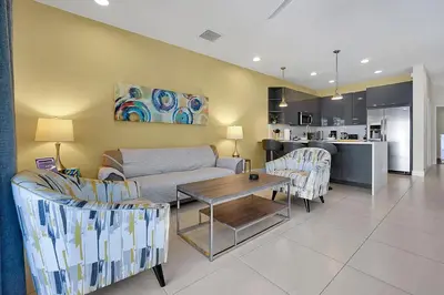 a living room with a couch and chairs and a table at Family-Friendly home w/ Pool & Resort Perks Near Disney in Orlando