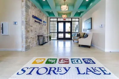 a lobby with a monopoly sign on the floor in a room at Magical Townhome private pool in Storey Lake in Kissimmee