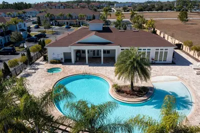 an overhead view of a swimming pool at a resort at Modern 3 Bed Villa Newly Renovated Prime Location in Kissimmee