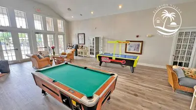 a living room with a pool table in it at Villas Standard Seven Dwrafs Resort - Close to Disney in Kissimmee