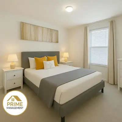 a bedroom with a large bed with yellow pillows at New 3BD3BA Townhouse Themed Near Disney in Kissimmee