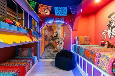 a colorful room with two beds and a playroom at Magical 6BR Family Retreat with Pool Near Disney in Orlando