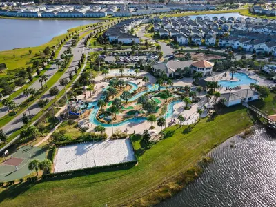 an aerial view of a resort near the water at Themed 3-bed 2 bath condo at Storey Lake Resort in Kissimmee