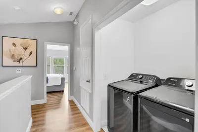 a kitchen with a stove and a sink in a room at Windsor Hills Water Park Adventure Home in Orlando