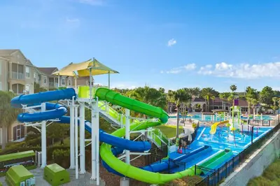 a water park with a water slide at a resort at Windsor Hills Water Park Adventure Home in Orlando