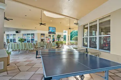 a ping pong room with a ping pong table at Windsor Hills Condo: Water Park Included in Orlando