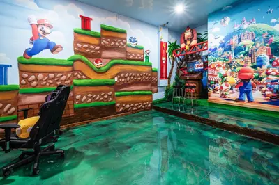 a swimming pool in a room with a mural at Luxury Meets Adventure 8BR Condo with Themed Rooms in Orlando