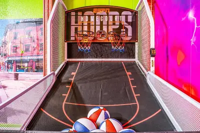 a basketball court with balls on a basketball hoop at NEW Spectacular Home Windsor Hills in Orlando