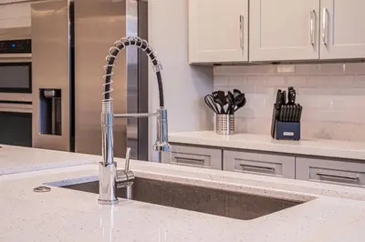 a kitchen with a kitchen sink with a faucet at NEW Spectacular Home Windsor Hills in Orlando