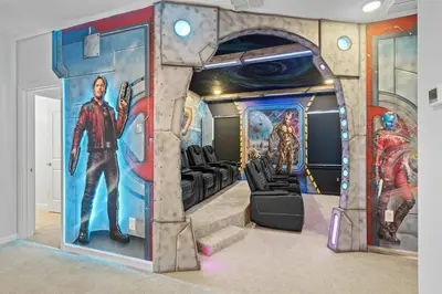 a room with a captain america mural on the wall at Paradiso Grand Resort 6 bedroom in Orlando