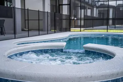 a swimming pool with water in the middle of a building at Themed Retreat 6BR w Magical Rooms Private Pool in Orlando