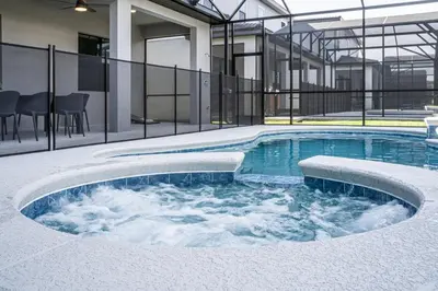 a hot tub in the middle of a building at Themed Retreat 6BR w Magical Rooms Private Pool in Orlando