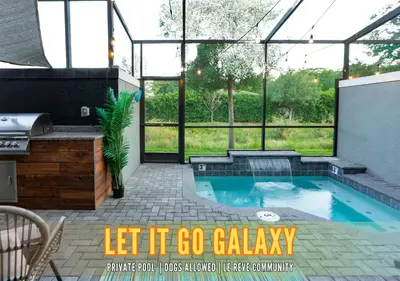 a patio with a swimming pool in a house at Star Wars and Frozen, Pool, 10 min to Disney in Kissimmee