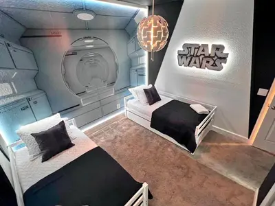 a room with two beds in a star wars room at Spacious 5BR Villa w/ Private Pool Near Disney & Orlando! in Kissimmee